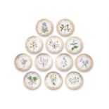 A SET OF TWELVE ROYAL COPENHAGEN FLORA DANICA PORCELAIN PLATES