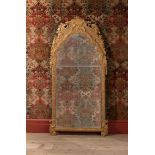 A LARGE GEORGE I CARVED GILTWOOD AND GESSO MIRROR, CIRCA 1720