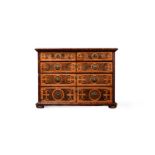 A CHARLES II OLIVEWOOD OYSTER, WALNUT, LABURNUM AND HOLLY INLAID CHEST OF DRAWERS, CIRCA 1680