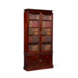 A GEORGE II CARVED MAHOGANY BOOKCASE OR 'CHINA CABINET', CIRCA 1740-50