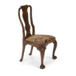 A GEORGE II WALNUT AND NEEDLEWORK UPHOLSTERED CHAIR, IN THE MANNER OF GILES GRENDEY, CIRCA 1730