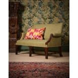 A GEORGE III MAHOGANY AND FRET CARVED SETTEE, CIRCA 1780