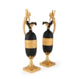A LARGE PAIR OF ORMOLU MOUNTED BRONZE JUGS OR EWERS, AFTER CLAUDE GALLE, FRENCH, EARLY 20TH CENTURY