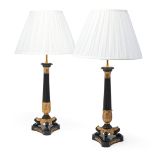 A PAIR OF GILT AND PATINATED BRONZE CANDLESTICK TABLE LIGHTS, FRENCH, 19TH CENTURY