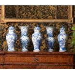 A GARNITURE OF FIVE CHINESE BLUE AND WHITE VASES AND COVERS, 19TH CENTURY