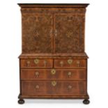 A WILLIAM & MARY WALNUT, OLIVEWOOD OYSTER AND LABURNUM CABINET ON CHEST, CIRCA 1690