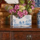 AN ENGLISH DELFT CHINOISERIE BLUE AND WHITE FLOWER BRICK, CIRCA 1760