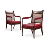 A PAIR OF GEORGE III GOTHIC MAHOGANY AND CANED LIBRARY ARMCHAIRS, CIRCA 1790, ATTRIBUTED TO GILLOWS