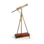 A LACQUERED BRASS PORTABLE FLOOR-STANDING, 3.5 INCH REFRACTING TELESCOPE