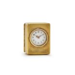 A GEORGE V ENGINE-TURNED SILVER GILT MINIATURE TIMEPIECE
