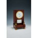 A FINE AND RARE FRENCH CONSULATE PERIOD FIGURED MAHOGANY ‘AUDIENCE’ TIMEPIECE