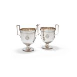 A PAIR OF FRENCH SILVER TWIN HANDLED PEDESTAL WINE COOLERS, MAKER'S MARK AE OVER G