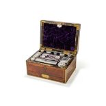 Y A MAHOGANY AND BRASS BOUND TRAVELLING TOILET BOX, CIRCA 1830
