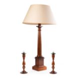 A LARGE MAHOGANY COLUMN TABLE LAMP, BY SIBYL COLEFAX & JOHN FOWLER, WITH A PAIR OF CANDLESTICKS