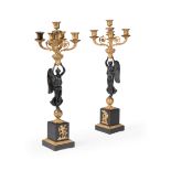 A PAIR OF FRENCH 'EMPIRE' GILT AND PATINATED BRONZE CANDELABRA, CIRCA 1840