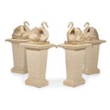 A SET OF FOUR CARVED WOOD AND PAINTED SWANS ON PEDESTALS, CONTEMPORARY