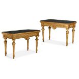 A PAIR OF ITALIAN CARVED GILTWOOD AND PORTORO MARBLE TOPPED CONSOLE TABLES, LATE 18TH CENTURY