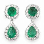 Pair of 18ct white gold emerald and diamond pendant earrings