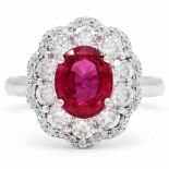 18ct white gold unheated oval ruby and round brilliant cut diamond cluster ring