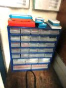 Multi drawer storage unit with assorted tips