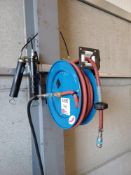 Wall mounted retractable air hose
