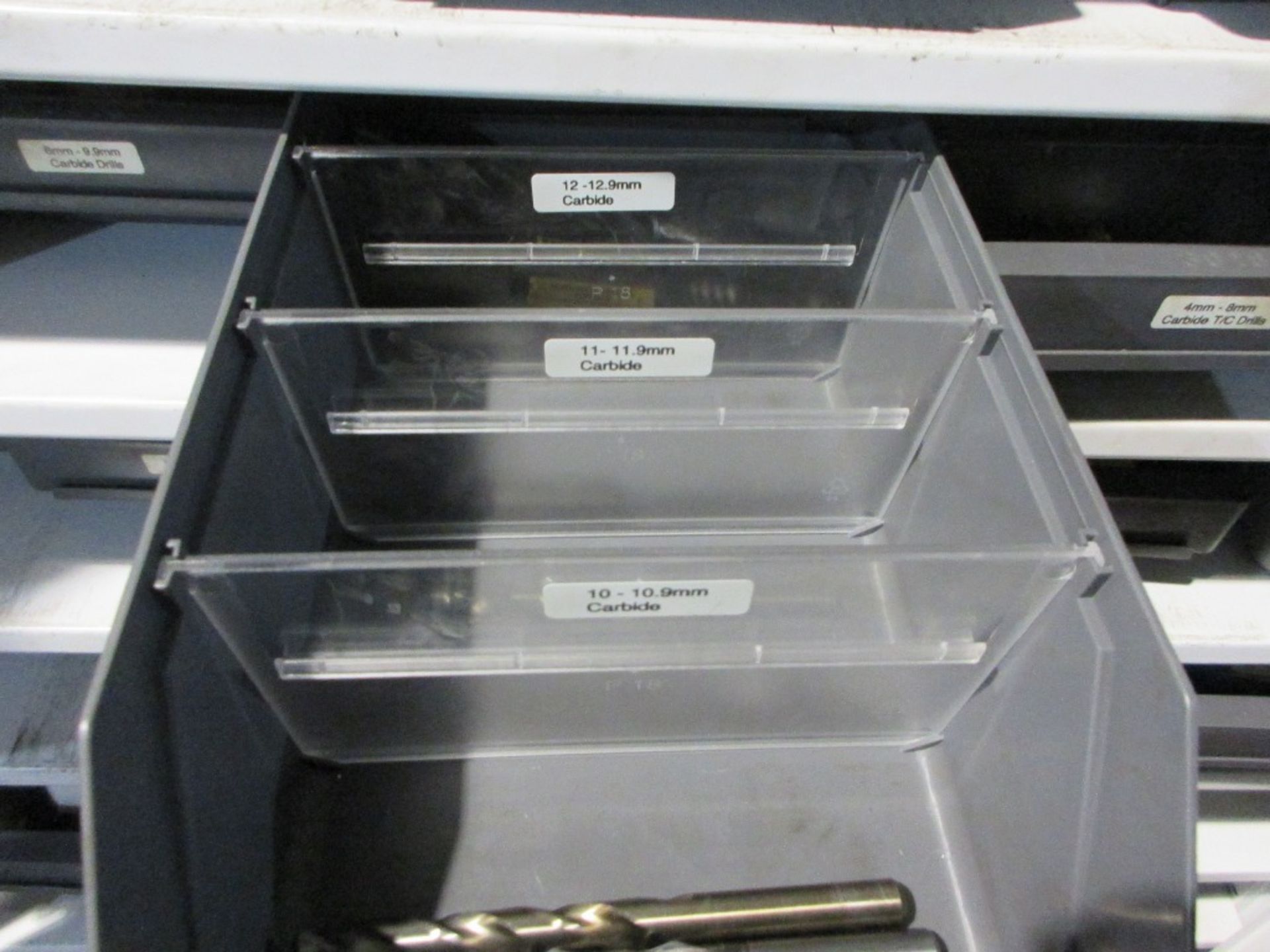 Metal 2 door storage cupboard with contents including drill bits ...