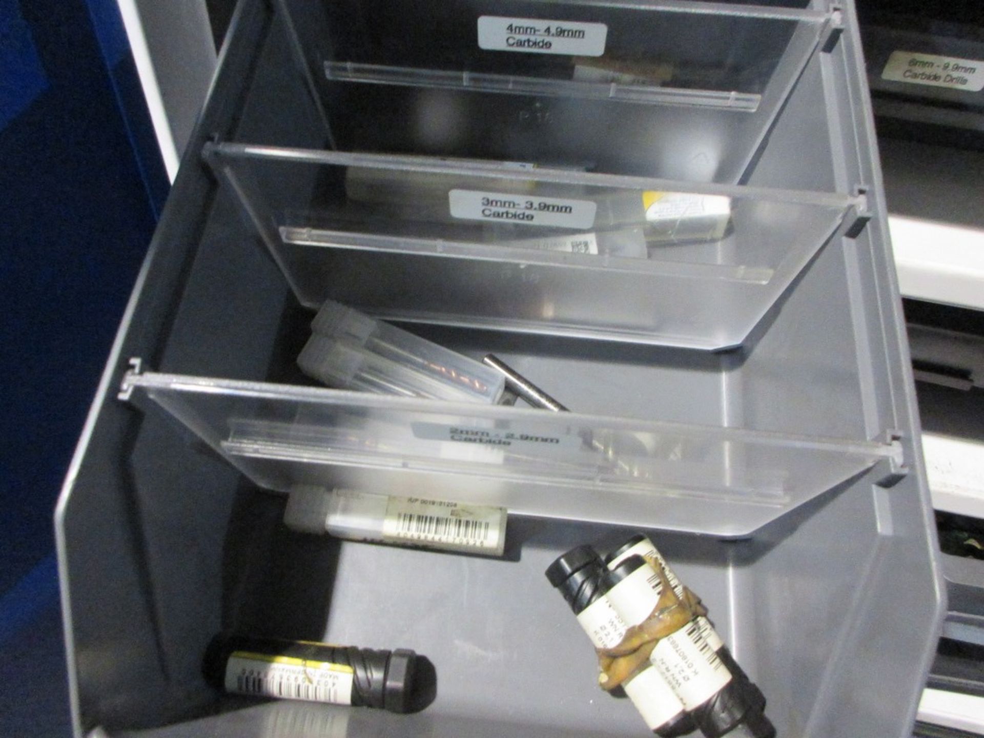 Metal 2 door storage cupboard with contents including drill bits ...