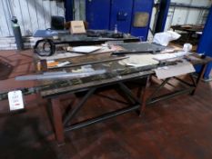 Two steel framed workbenches and miscellaneous steel contents, tables approx. 3000 x 1500mm and 2450