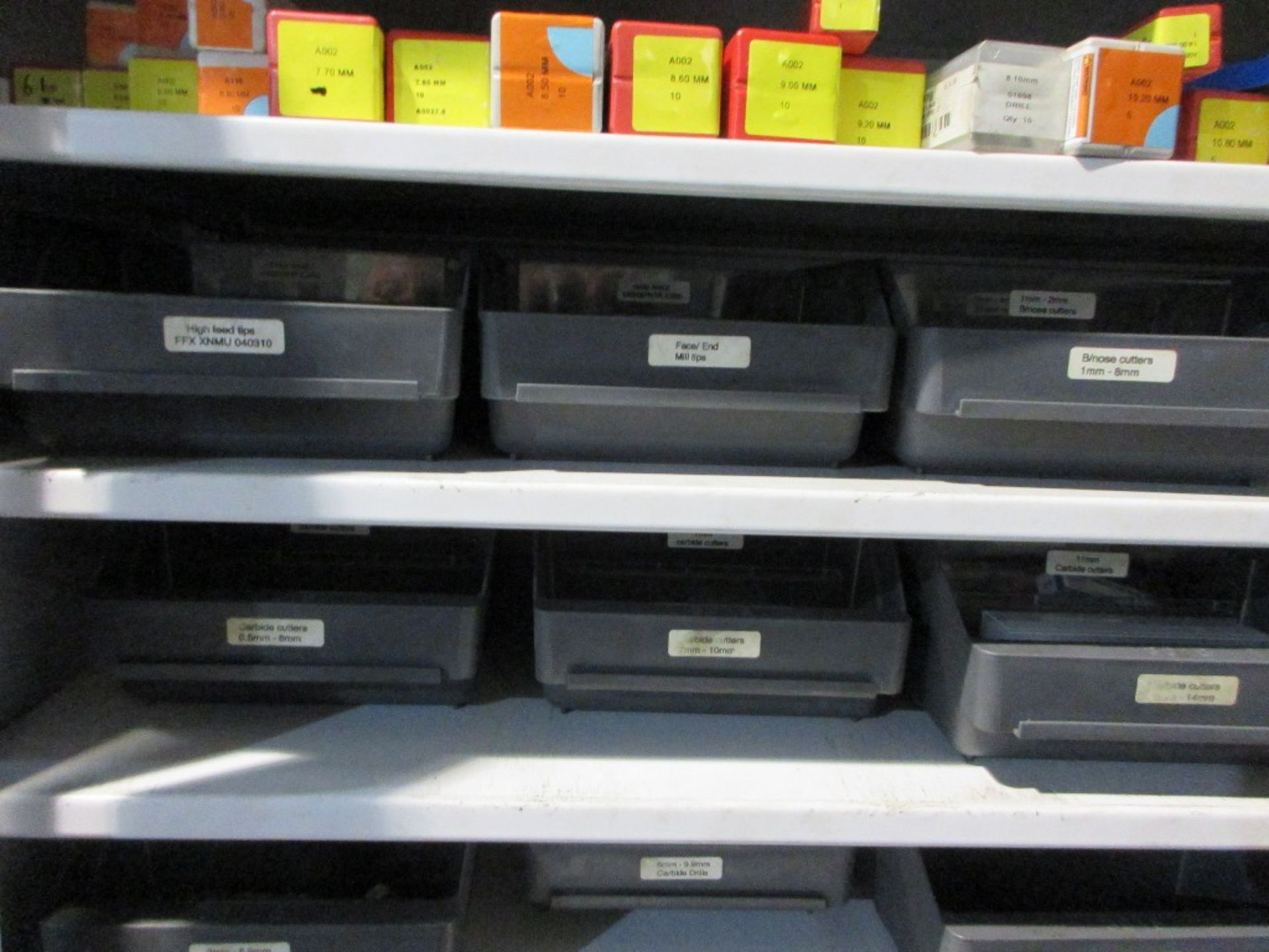 Metal 2 door storage cupboard with contents including drill bits ...