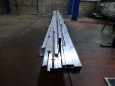 Quantity of assorted aluminium box section lengths, some up to circa 6m length (excludes trolley)