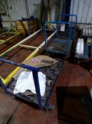 Three mobile steel framed trollies