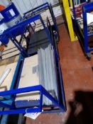 Three steel framed mobile trollies (excluding contents)