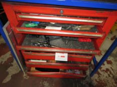 Damaged mobile tool cabinet with contents including aluminium machine parts, etc.