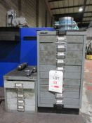 Two Bisley metal multi drawer storage units with contents including hole saws, drill bits,