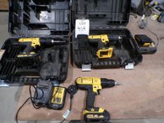 Three Dewalt DCD776 cordless drivers, four batteries, two chargers