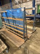 Two steel A frame mobile glass carts