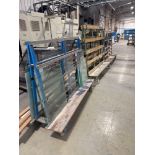 Three various steel framed mobile glass carts