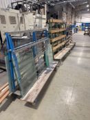 Three various steel framed mobile glass carts