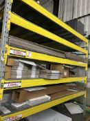 Contents of bay of racking to include various cardboard boxes and sheet stock (as lotted). Please