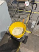 Manual salt spreader