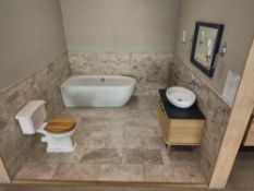 Display bathroom to include bath, toilet, sink, mirror, towel rail, taps and accessories, as lotted
