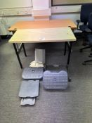 Two assorted light wood veneered desks, laptop stand and three assorted foot rests as lotted