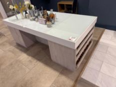 Glass topped display desk with desk and contents