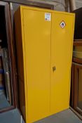 Steel double-door flammables cabinet with contents