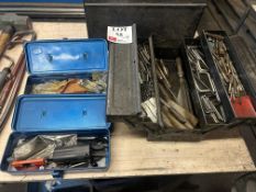 Three various toolboxes to include various hand tools and machine cutting bits, as lotted