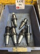 Six various BT40 quick change machining tool holders, complete with various cutting tools