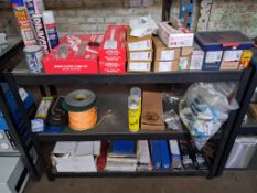 Bay of assorted workshop consumables incl. grease guns, welding rods etc