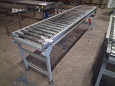 Interroll powered 3 phase roller conveyor