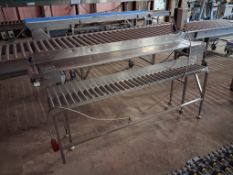 Two tier packing/take off station with roller bed to lower level.