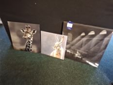 3 Various images to include glass giraffe, canvas hare, canvas central station
